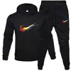 Conjunto de Moletom Esportivo Masculino Novo Primavera e Outono Moda Solta para Jovens Calça Casual Conjunto de Duas Peças