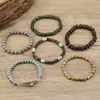 Verano 2024 nuevo transfronterizo más vendido simple moda bohemio pluma con cuentas madera con cuentas pulsera 6 piezas