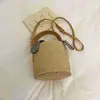 Bolso de Paja Tejida Estilo Cubo Cuadros de Lazo para Mujer 2026 Nueva Moda Versátil de Hombro Cruzado Elegante Bolso de Mano de Paja Tejida