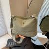 Bolso bandolera casual de nicho transfronterizo de lona para mujer 2025 Nuevo moderno versátil moda un solo hombro ligero mochila deportiva