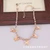 Tobillera con colgante de mariposa de pedrería creativa transfronteriza para mujer, popular elemento de mariposa, nuevo y brillante adorno para el pie incrustado con diamantes