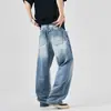 Verão 2026 Nova Moda de Rua Jeans Azul Rasgado Solto de Perna Reta Casual Versátil Em Estoque Atacado