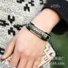 Venta caliente Nuevo brazalete de cuero genuino brazalete tejido venta al por mayor directo de fábrica brazalete de piel de vaca con cuentas joyería de Yiwu