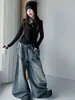 Nuevo conjunto de mezclilla para niñas estilo coreano con estampado de grafiti para otoño, pantalones tipo papá para niñas de primavera y otoño con camiseta básica de manga larga