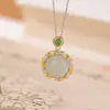Yiluyin Plata de Ley S925 Chapada en Oro Jade Natural Hetian Jade de Agua Clara Patrón Retorcido Geométrico Redondo Colgante de Plata Versátil