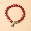Venta al por mayor de fábrica pulsera de un solo círculo imitación cinabrio étnico hebilla de paz valiente colgante de múltiples estilos pulsera de cinabrio exquisita