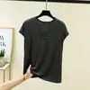 Nuevo modelo de verano, camiseta sin mangas de modal con cuello ovalado, corte holgado, adelgazante, talla grande, top simple y versátil