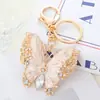 Llavero de Mariposa Exquisita con Diamantes Incrustados Nuevo Esmaltado Transfronterizo Colgante para Bolso de Mujer Llavero de Coche