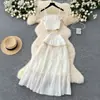 Conjunto de Roupa para Primavera 2025: Top Halter Elegante com Bordado de Lantejoulas e Franjas para Mulheres, Saia Evasê de Cintura Alta Emagrecedora