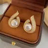 Brincos de pérolas estilo luxo leve atacado feminino Coreia do Sul temperamento rede brincos vermelhos novos brincos da moda alto senso
