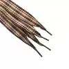 Cordones de cinta anchos y planos en un patrón de tartán escocés, perfectos para un estilo preppy de color café, con acentos de cinta de tul de color sólido en tono café.
