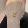 Collar con dosel de flor de loto de acero de titanio para mujer, cadena de clavícula elegante, de lujo, de alta gama, ligera y resistente a la decoloración.