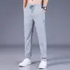 Estilo coreano Slim-Fit Cintura Solta Calças Casuais Masculinas Finas Nova Moda Solta All-Match Seda de Gelo Reta Homens de Verão
