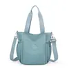 2026 Nueva Bolsa de Viaje de Tela de Nylon, Gran Capacidad, Bolso de Mano Ligero, Bolso de Hombro Cruzado Casual de Moda y Versátil