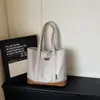 Bolsa de lona de gran capacidad para mujer, nuevo modelo de verano 2026, adecuada para la escuela y el trabajo, bolso de mano, bolso cubo de gran capacidad, bolso de hombro