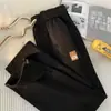 Calça de moletom waffle da moda transfronteiriça para homens, calça esportiva reta para primavera e outono da alta rua americana com toque fluido, calça casual masculina