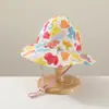 Sombrero de pescador para bebé al por mayor moda estampado pequeño fresco sombrero para el sol dos lados disponibles sombrero para niños versión coreana
