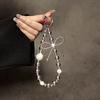 Lanyard corto para teléfono móvil de bola con strass y lazo estilo femenino