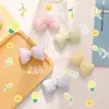 Nuevo estilo pastoral de verano broche de girasol con lazo colgante para bolso de niña linda accesorios de ropa estilo coreano