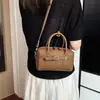 Otoño 2026 Nuevo Bolso Boston Simple de Alto Valor Estilo Coreano Moda de Nicho Elegante Bolso de Hombro Cruzado para Mujer