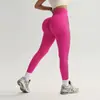 Calça de yoga feminina europeia e americana transfronteiriça com design vazado, cintura alta, levanta bumbum, ajuste justo em formato de pêssego, calça esportiva de secagem rápida