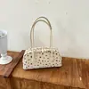 Bolsa de bowling de nicho estilo coreano, nova coleção outono 2026, bolsa de ombro de grande capacidade, bolsa almofada moderna e estilosa para trabalho e deslocamento