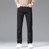 Ropa para Hombre Xintang Dropshipping 2026 Jeans Negro Puro para Hombre de Gama Alta Lujo Ligero de Negocios Corte Delgado Elásticos Pierna Recta Pequeña Pantalones para Hombre