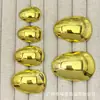 Botões metálicos únicos em formato de gota para ternos, casacos de lã tricotada, botões decorativos simples e versáteis para costura à mão