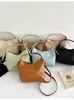 Bolso Retro para Commuter para Mujer 2026 Nuevo Bolso Cubo de Gran Capacidad Bolso de Mano Versátil Casual Bolso de Hombro Cruzado de Moda