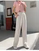 Pantalones de pierna ancha de seda helada con bolsillo de solapa para mujer de verano, pantalones casuales drapeados para personas bajitas, look holgado adelgazante y pantalones versátiles de longitud media para mujer