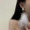 Pendientes de plumas de diamante con lazo de temperamento dulce de lujo ligero, moda exagerada, personalidad, pendientes de felpa de hada