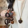 Nuevo Collar Colgante Largo Corazón Color Café Estilo Chino Cadena de Suéter Estilo Antiguo Zen Retro Cordón Accesorios Decorativos para el Cuello