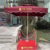 Fábrica de Shenzhen paraguas grande parasol exterior soporte de seguridad paraguas Propiedad de imagen paraguas romano resistente al viento paraguas protector de puerta