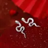 Pendientes de Serpiente 2025 Estilo Nuevo Lujo Accesible Gama Alta Elegantes Moda Asimétricos con Forma de Serpiente Pendientes Pendientes