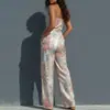 Novedad Primavera/Verano 2026 Ropa Europea y Americana para Mujer Transfronteriza Amazon Estampado Sexy Fresco Escote en V Profundo Espalda Descubierta Mono