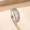 Joias Europeias e Americanas Transfronteiriças de Aço Titânio Anel Cruzado Oco por Pressão de Óleo Design de Nicho Europeu e Americano Anel de Aço Titânio Sem Cor