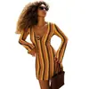 12153 Colección de otoño para mujer transfronteriza europea y americana: vestido bodycon, a rayas de bloques de color, corte ajustado, escote en V profundo, manga larga acampanada