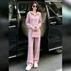 Conjunto esportivo casual rosa estilo coreano para mulheres, outono e inverno de 2026, jaqueta moletom com capuz jovem e calça pantalona conjunto de duas peças, moderno
