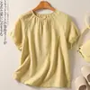 A nova camiseta de moletom estilo dopamina deste verão é uma peça versátil, de caimento solto e manga curta, feita de algodão e linho, sem elasticidade, para mulheres.