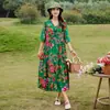 Vestido de algodão e seda brilhante e estiloso para viagem a Yunnan no início do verão de 2026, vestido de praia popular deste ano para mães, vestido longo esvoaçante