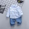 Traje nuevo de otoño para niños transfronterizos Camisa de coche de dibujos animados para niño Generación de fábrica de dos piezas de manga larga para niños pequeños y medianos