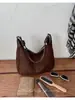 Bolsas Retrô Transfronteiriças Femininas Grande Capacidade 2026 Novo Estilo Design de Nicho Bolsa de Ombro Cruzada Para Aula Deslocamento Bolsa Tote