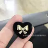 Botão de metal com flocado em losango para atacado, botão quadrado de camélia para casaco de tweed feminino, botão de laço em formato de coração