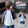 Camiseta de Manga Corta Raglán para Niños Verano 2026 Estilo Nuevo Camiseta Infantil de Bloques de Color de Media Manga Moderna Ropa de Verano para Bebé Camiseta