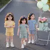 Nuevo Estilo Moda Casual para Niñas Cuello Redondo Manga Corta Pantalones Cortos Rayados para Niños Conjunto de Top y Shorts para Bebé de Verano