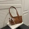 Bolsa Tendência Nicho Estilo Coreano 2026 Novo Modelo Bolsa Almofada Laço Bolsa de Ombro Único Transversal Bolsa Casual Simples de Alta Pressão