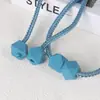 En stock hebilla de Cubo de Rubik correa de cortina moderna simple hebilla de cortina de Cubo de Rubik accesorios de cortina sin perforación fabricantes venta al por mayor