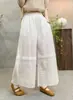 Estilo novo de verão estilo Mori girl artístico cintura elástica cor sólida design de retalhos vazado calças retas largas versáteis atacado