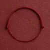 A pulseira da sorte deste ano, uma pulseira de fio vermelho finamente trançada, uma pulseira de fio vermelho para bebê, uma pulseira protetora para crianças para boa sorte e segurança, uma linha para o pé