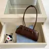 Nuevo bolso baguette de diseño nicho coreano para otoño con patrón de lichi, bolso vintage largo para el antebrazo para ir al trabajo, bolso de hombro a la moda